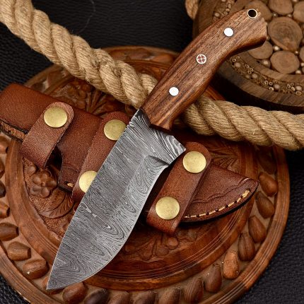 BCK Damascus steel fixed blade hunting knife with rose wood handle and leather sheath.