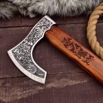 Handmade carbon steel Viking axe with rose wood handle and leather sheath.