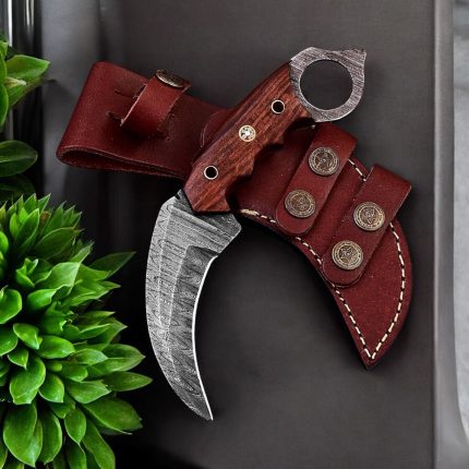 7.5″ handmade Damascus steel ultra-sharp karambit knife with leather sheath and rose wood handle.