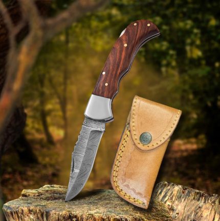 6.5″ Damascus steel outdoor pocket knife with leather sheath.